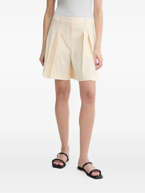 pleated-front tailored shorts by THEORY