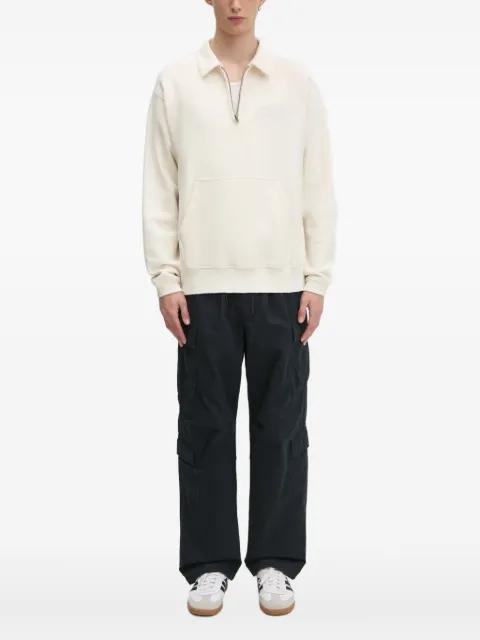 half-zip kangaroo pocket sweatshirt by THISISNEVERTHAT