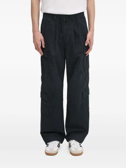 multi-pocket cargo pants by THISISNEVERTHAT