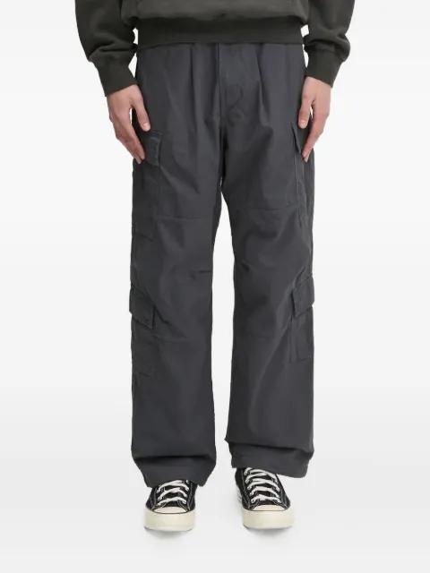 multi-pocket cargo trousers by THISISNEVERTHAT