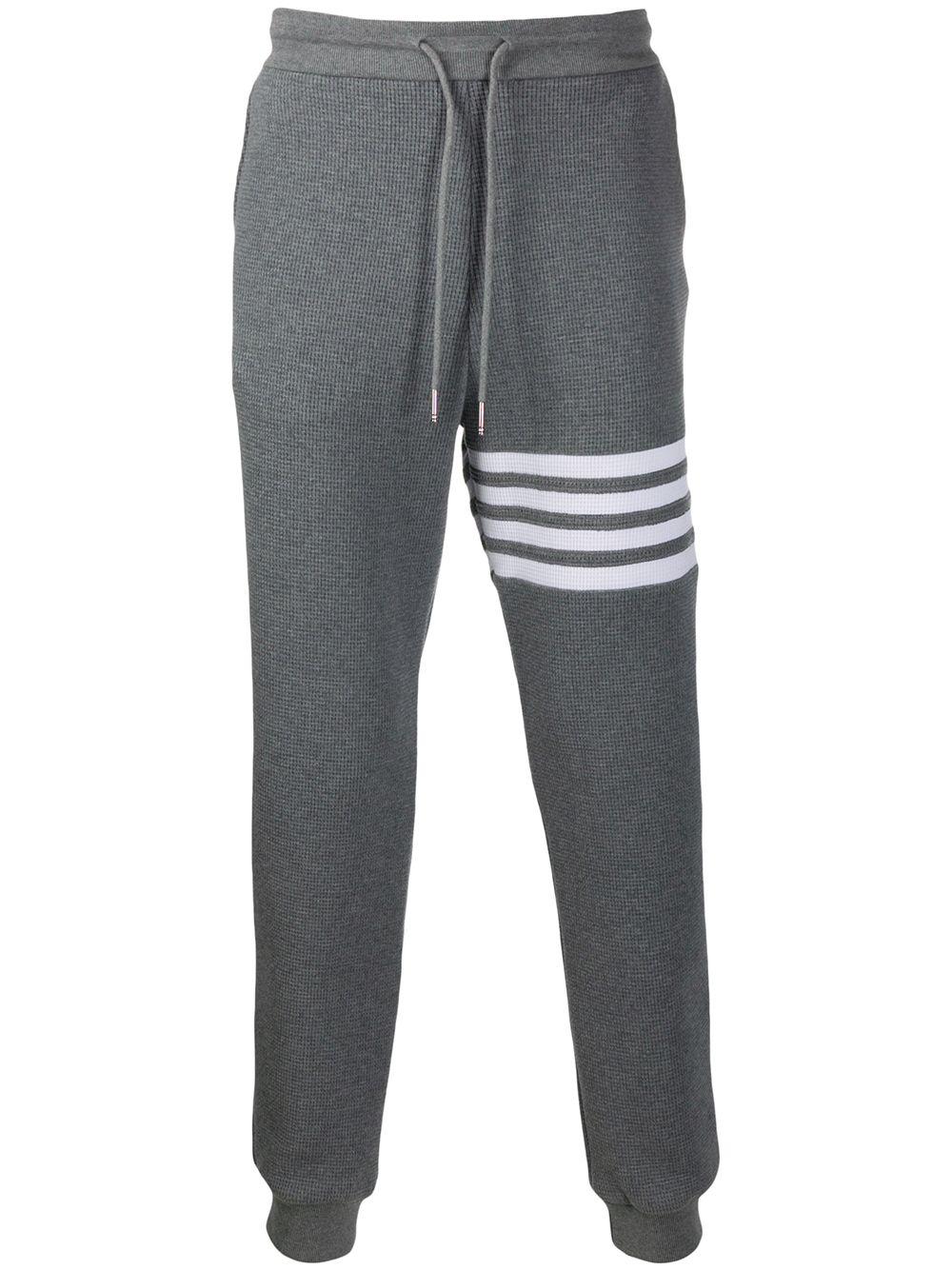 4-Bar waffle stitch track pants by THOM BROWNE