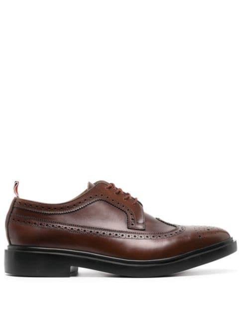 Longwing round-toe brogues by THOM BROWNE