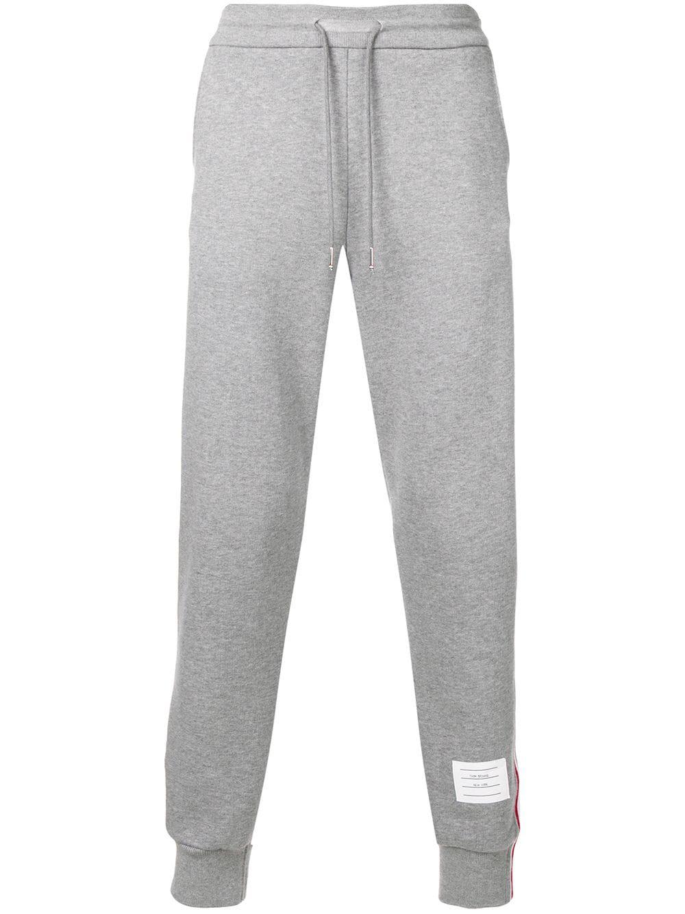 RWB Stripe-trimmed track pants by THOM BROWNE