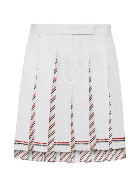 RWB bugle bead tipping low rise pleated skirt by THOM BROWNE