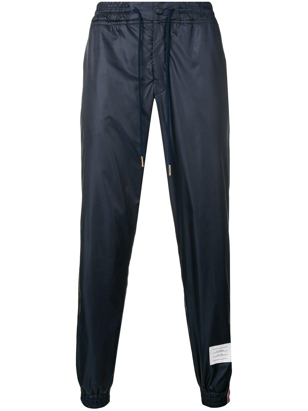 Rwb stripe ripstop track pants by THOM BROWNE