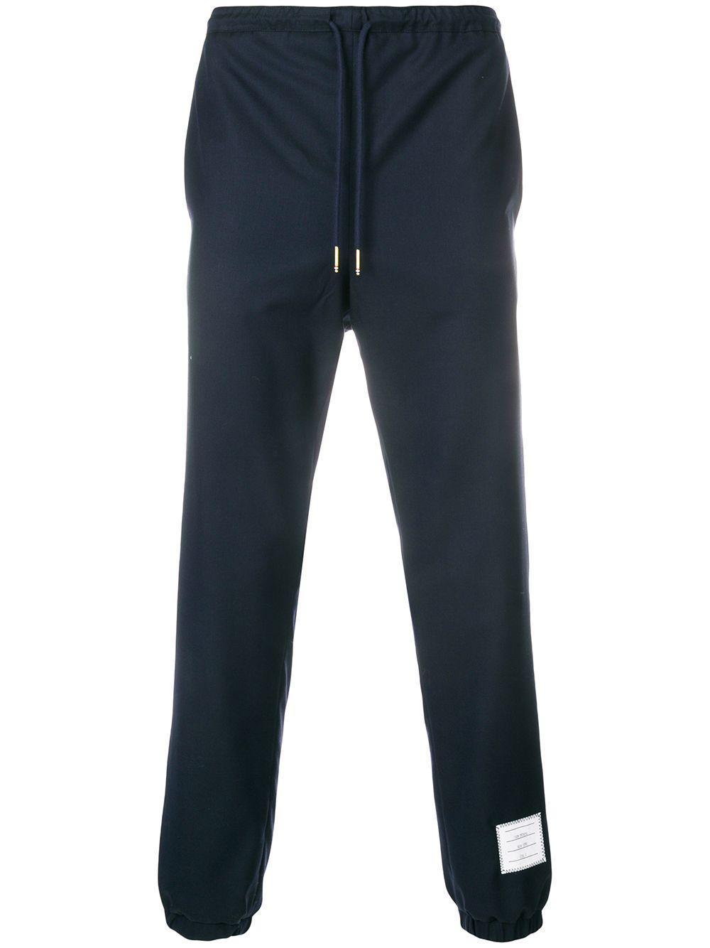 Super 120's swill track pants by THOM BROWNE