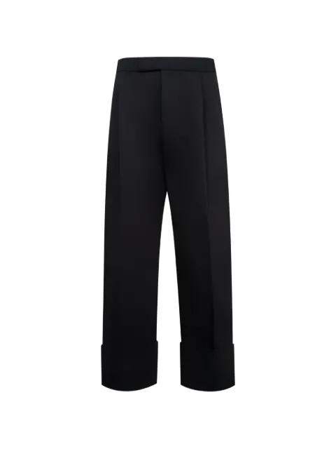 double pleat trousers by THOM BROWNE