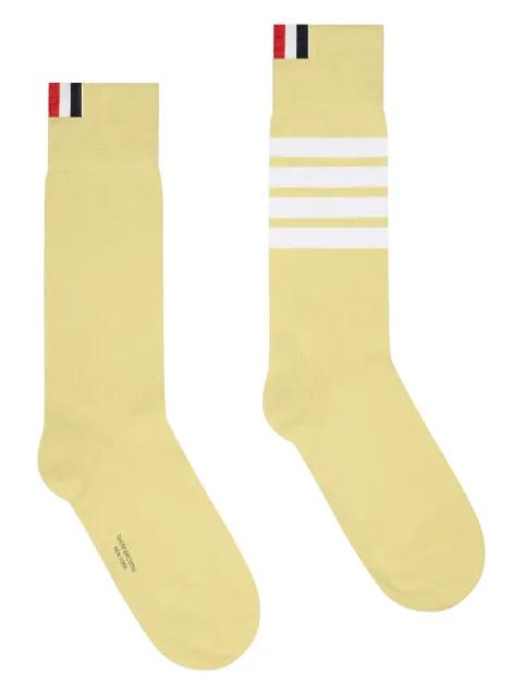 four-bar striped socks by THOM BROWNE