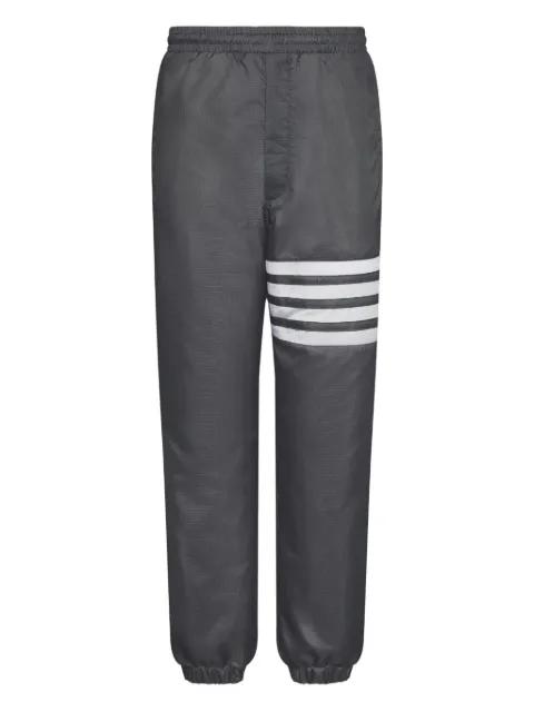 grey track pants by THOM BROWNE