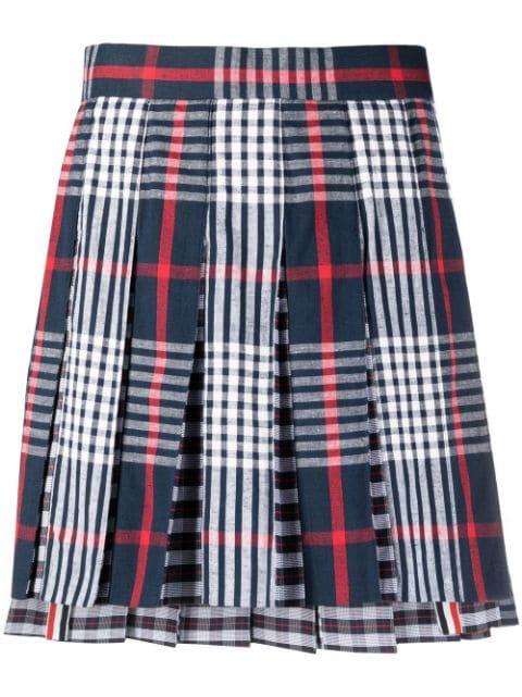 pleated asymmetrical skirt by THOM BROWNE