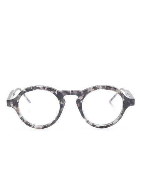 round-frame glasses by THOM BROWNE