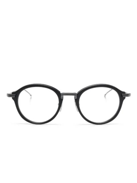 round-frame glasses by THOM BROWNE