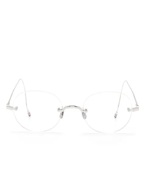 round-frame glasses by THOM BROWNE