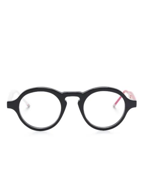 round-frame glasses by THOM BROWNE