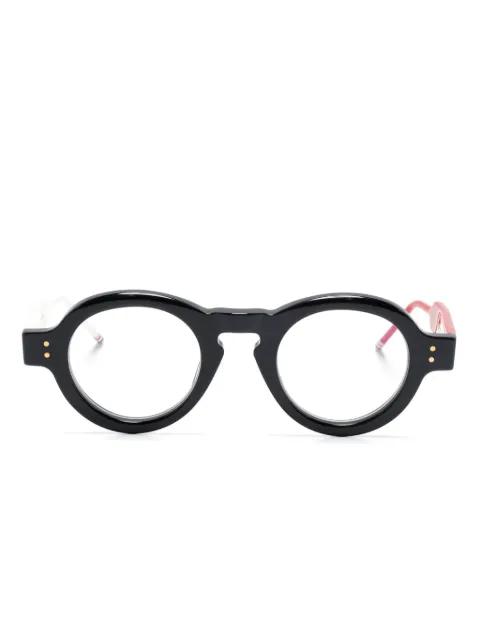 round-frame glasses by THOM BROWNE