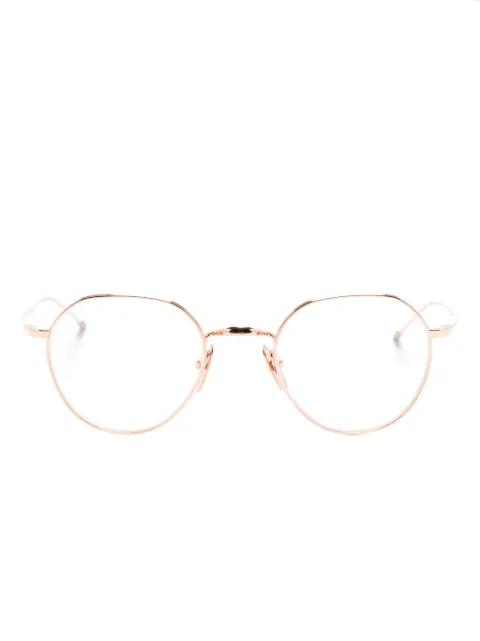 round-frame glasses by THOM BROWNE