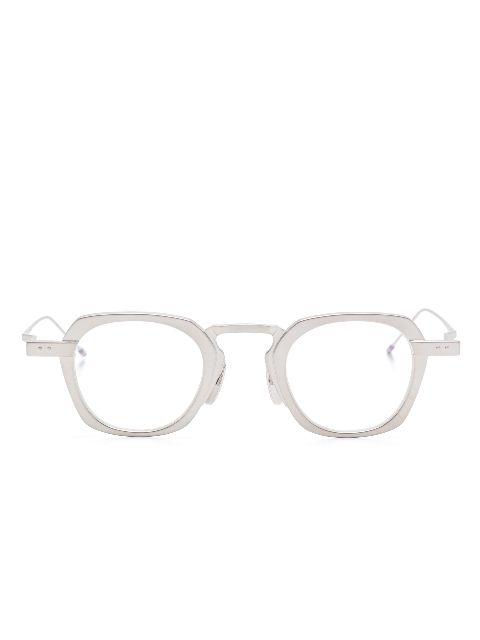 round-frame glasses by THOM BROWNE