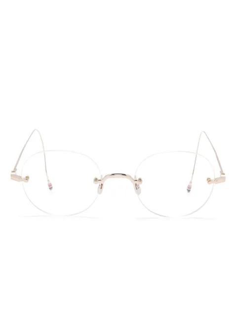 round-frame glasses by THOM BROWNE