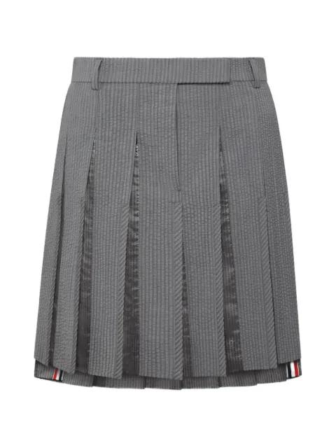 seersucker pleated mini skirt by THOM BROWNE