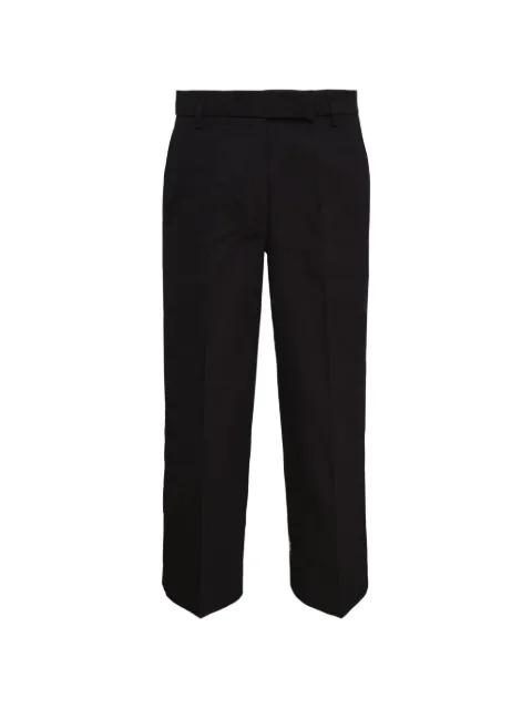 stripe-detail trousers by THOM BROWNE