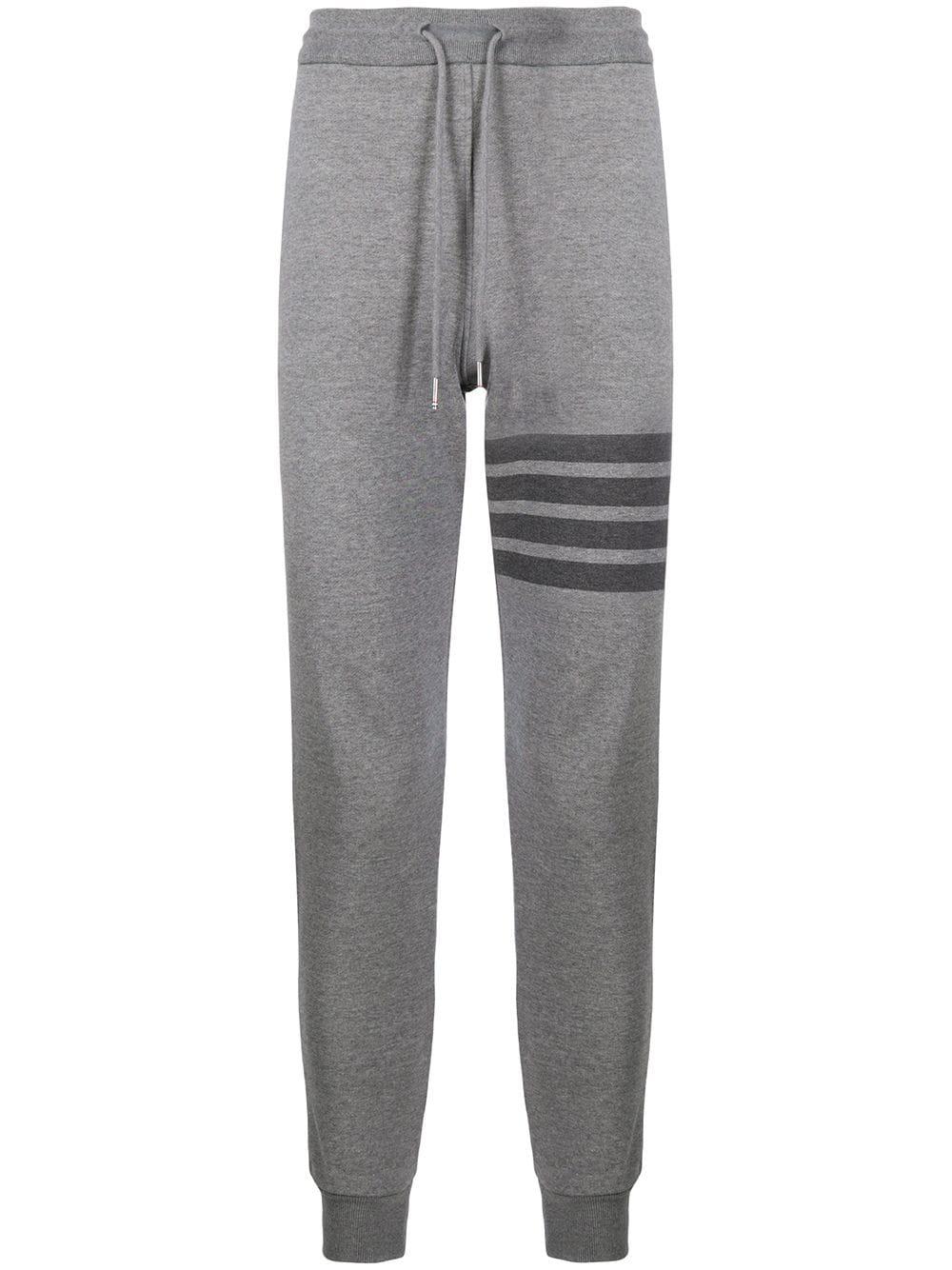 striped cotton track pants by THOM BROWNE