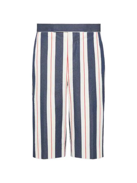 striped seersucker shorts by THOM BROWNE