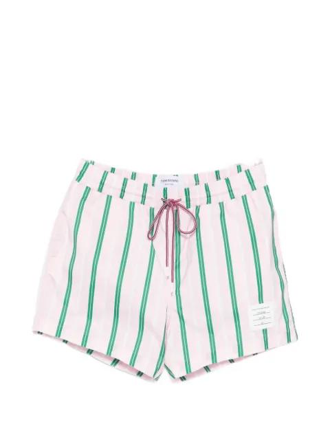 striped swim shorts by THOM BROWNE