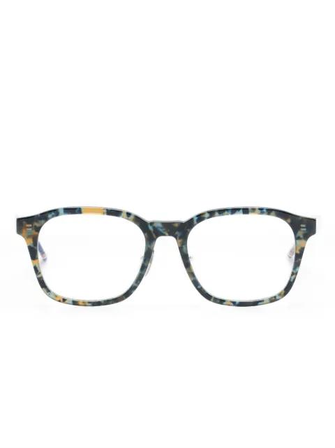 tortoiseshell-effect glasses by THOM BROWNE