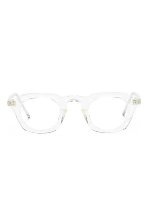 transparent-frame glasses by THOM BROWNE