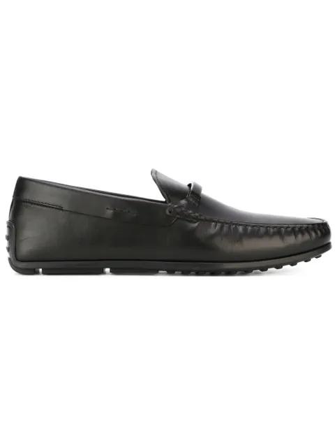 black loafers by TODS