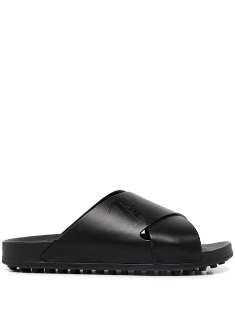 logo-debossed leather slides by TODS