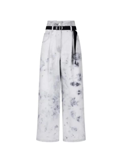 belted acid-wash jeans by TOMBOY