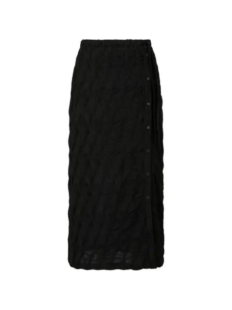 button-details skirt by TOMBOY