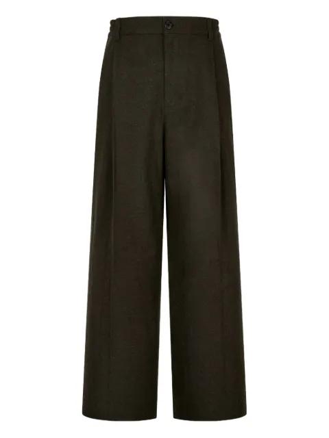 button-fastening pleated trousers by TOMBOY