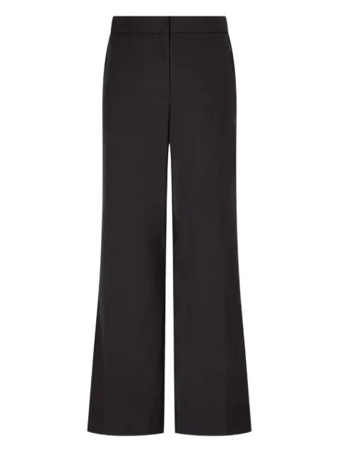 button-fastening trousers by TOMBOY
