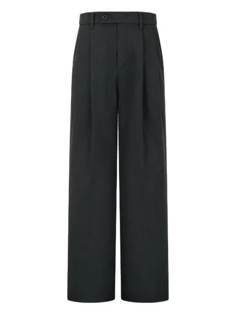 button-fastening trousers by TOMBOY