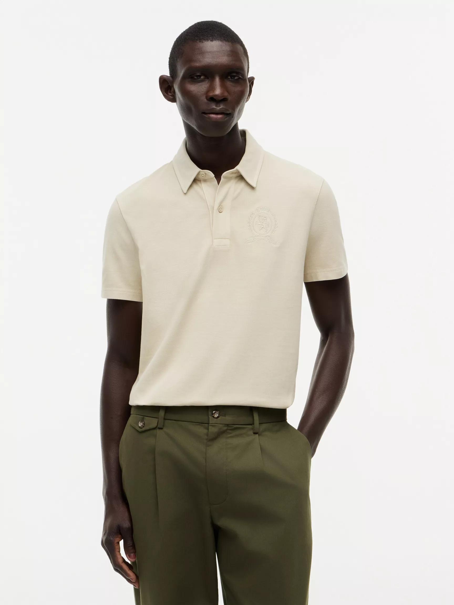 Regular Fit Garment-Dyed Crest Polo by TOMMY HILFIGER
