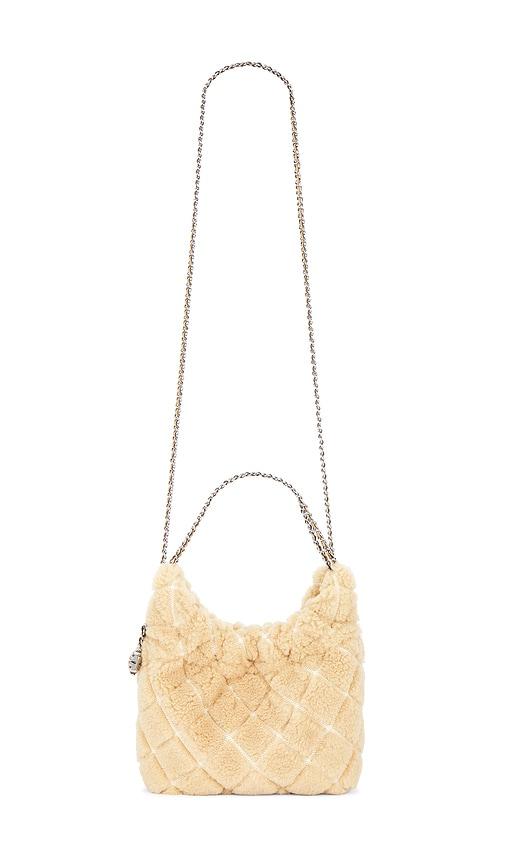 Tory Burch Fleming Shearling Mini Hobo Bag in Ivory by TORY BURCH