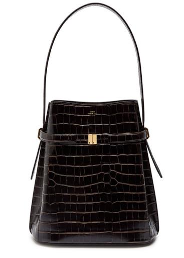 Belted crocodile-effect leather bucket bag by TOTEME