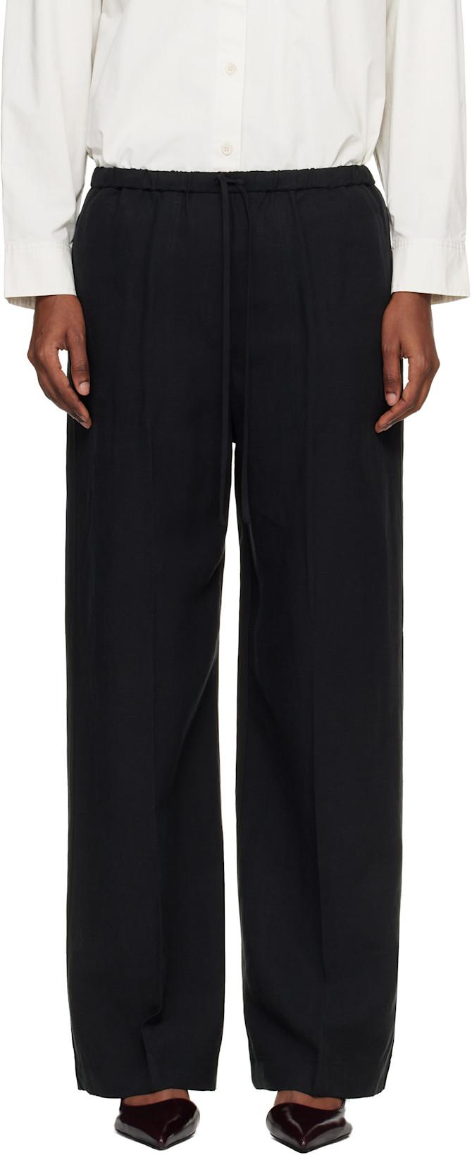 Black Fluid Drawstring Trousers by TOTEME