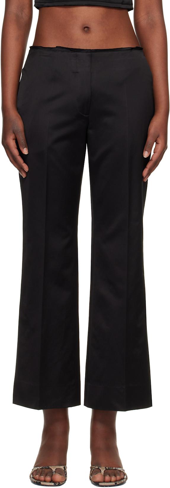 Black Kick Flare Raw-Edge Trousers by TOTEME