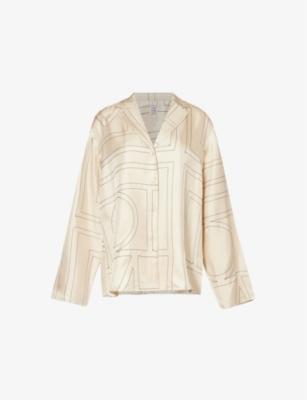 Brand-embroidered oversized-fit silk-twill shirt by TOTEME