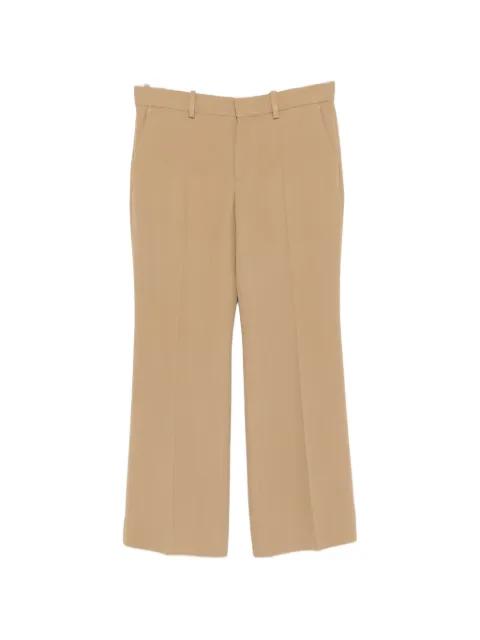 Kick pressed-crease flared trousers by TOTEME