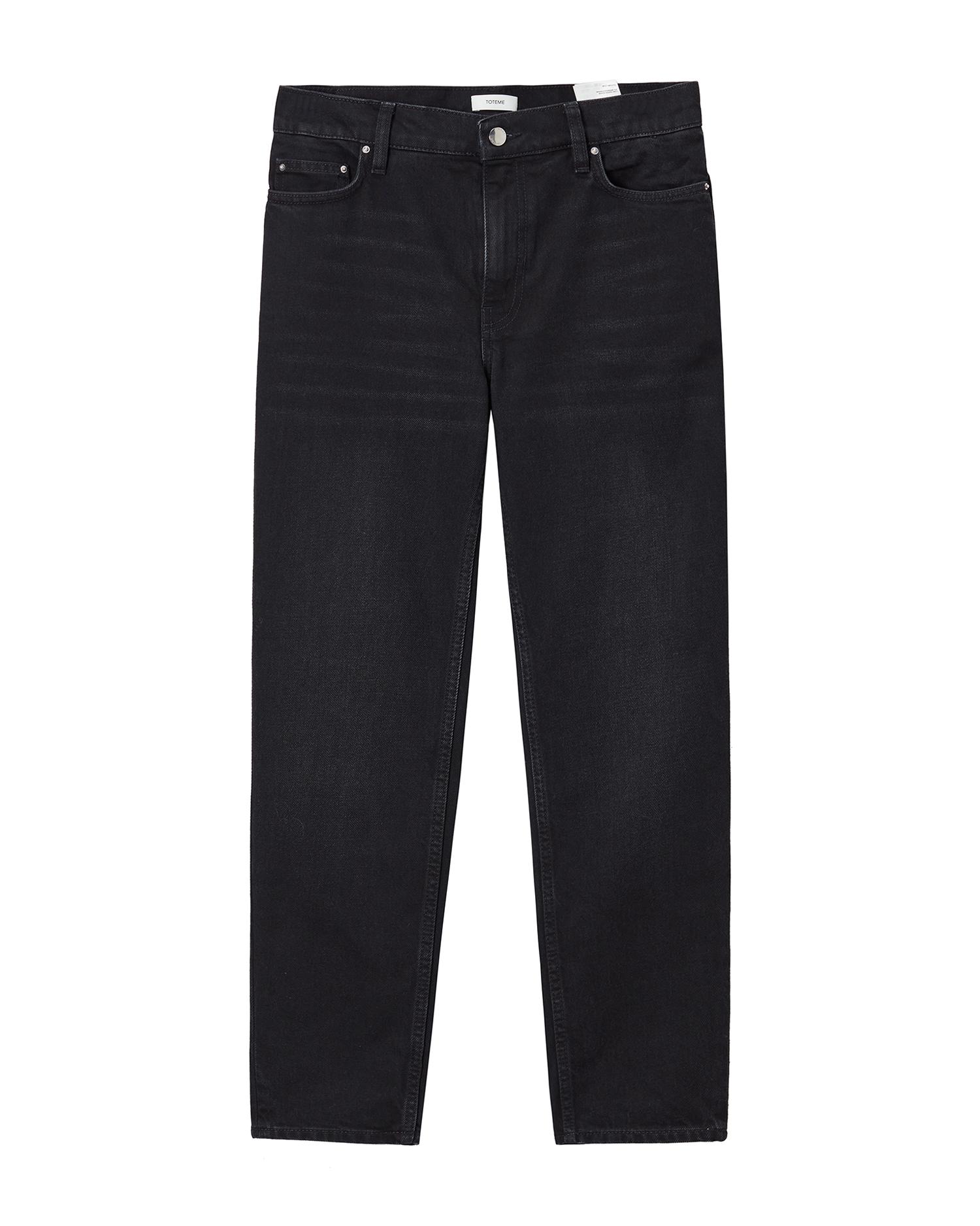 Low taper denim jeans by TOTEME