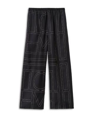 Monogram Silk Pajama Bottoms by TOTEME