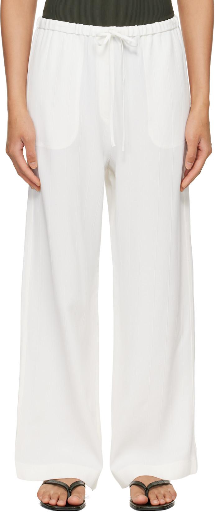 Off-White Woven Stripe Drawstring Trousers by TOTEME