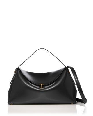 T-Lock Smooth Leather Convertible Top Handle Bag in Black by TOTEME T-Lock Smooth Leather Convertible Top Handle Bag in Black by TOTEME