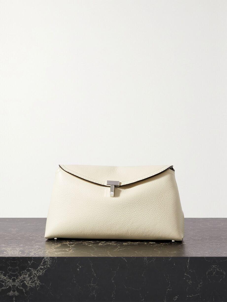 T-Lock textured-leather clutch by TOTEME