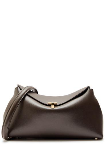 T-lock leather clutch by TOTEME