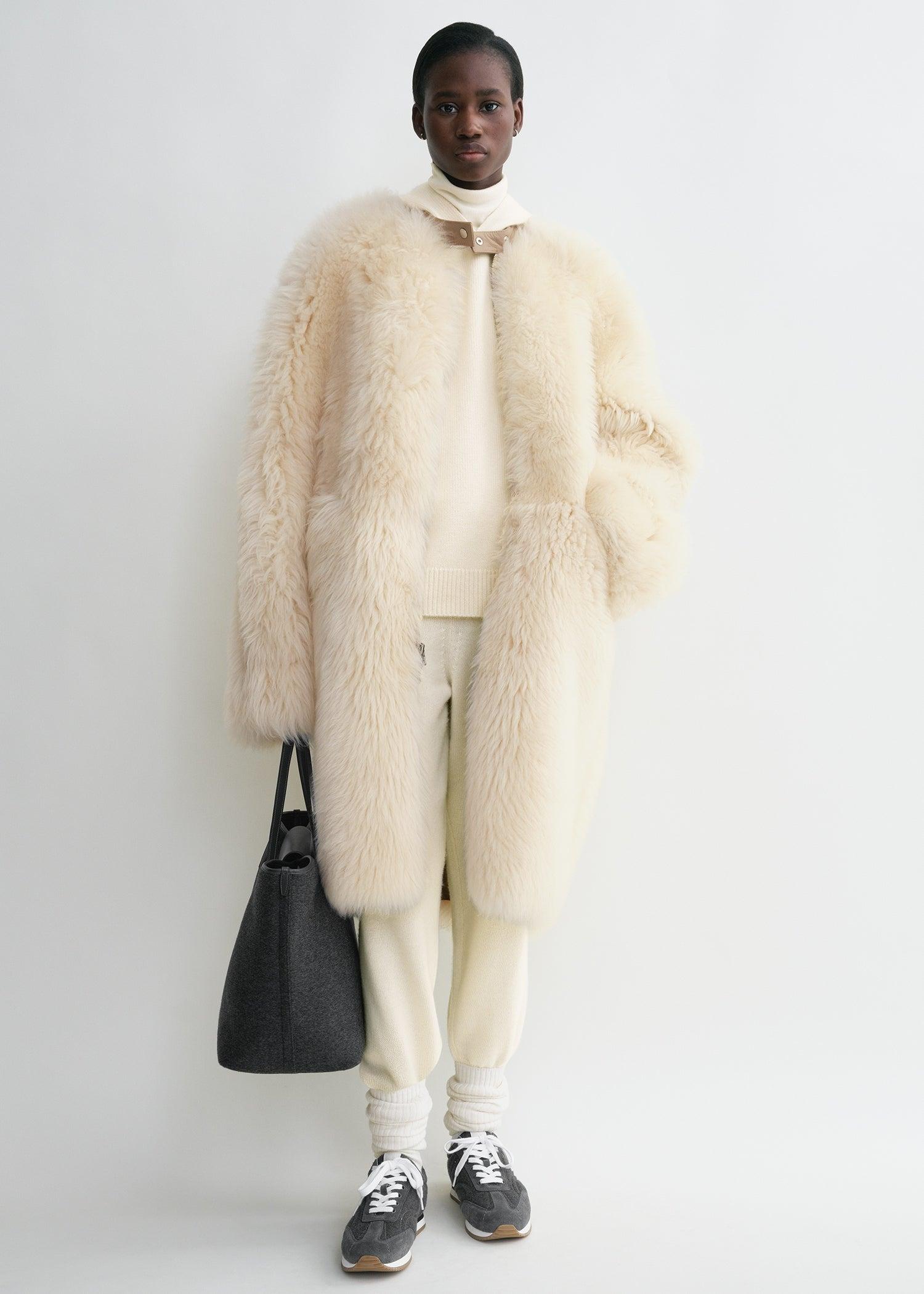 Two-way shearling coat cream/caramel by TOTEME